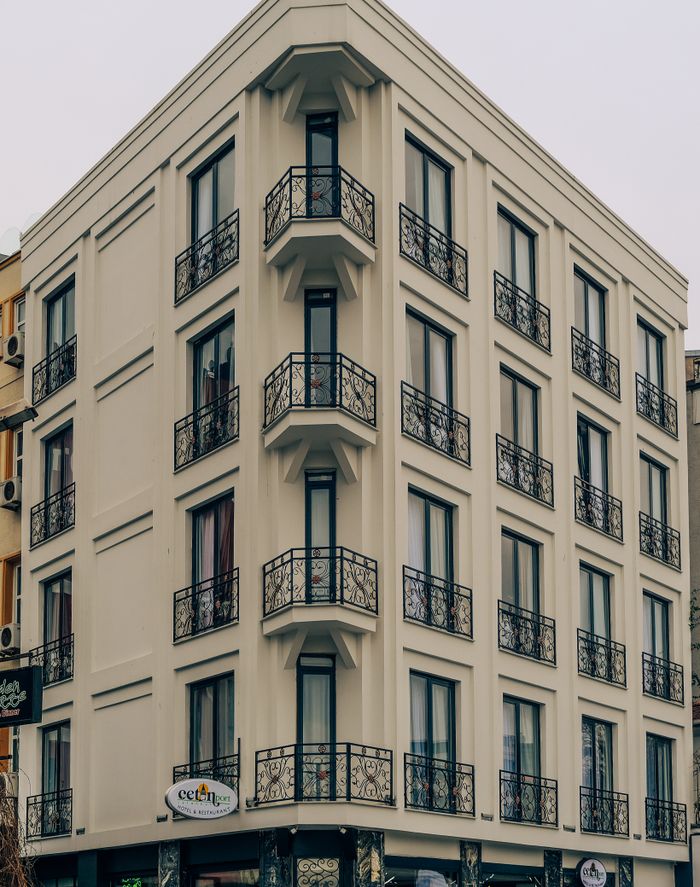European-style apartment building with wrought iron balconies in Istanbul.